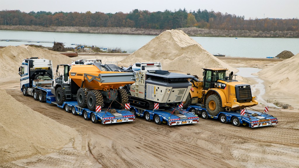 bouwmachine inkoop en klaar voor export op transport